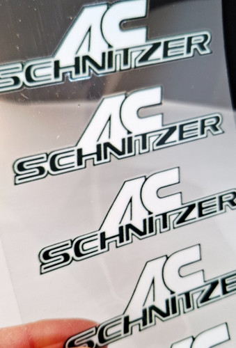 Schnitzer schriftzug - ac,